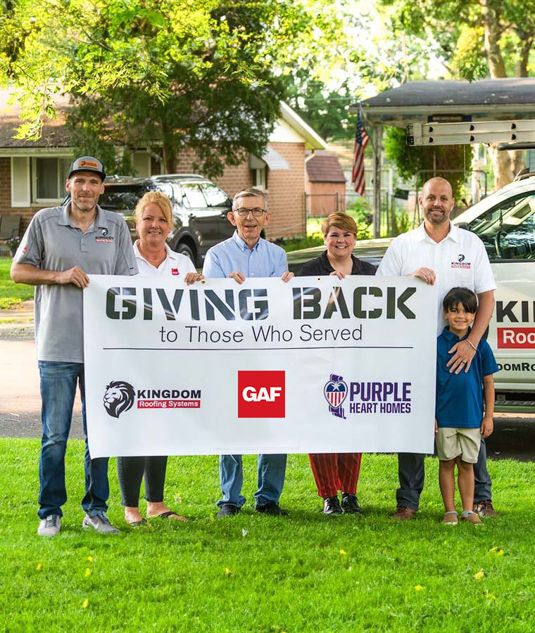 Kingdom Roofing Systems team at a Giving Back to Those Who Served charity roof project with GAF and Purple Heart Homes